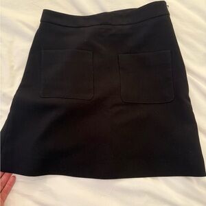 Black mini skirt with pockets